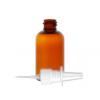 2 oz. Amber Translucent PET BPA Free 20-410 Plastic Boston Round Bottle-White Nasal Sprayer 3 1/2 in. DT