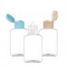 2 oz. Clear PET 20-410 Plastic Oblong Bottle- Beveled Sides-Dispensing Cap