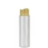 16 oz. Natural Cylinder Round 24-410 HDPE Semi-Opaque Flamed Plastic Bottle-Gold Smooth Disc-Top Cap